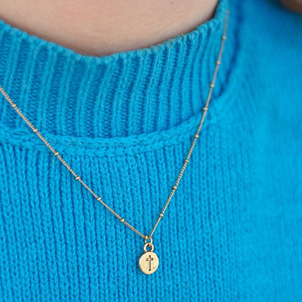 18 inch gold necklace with cross.